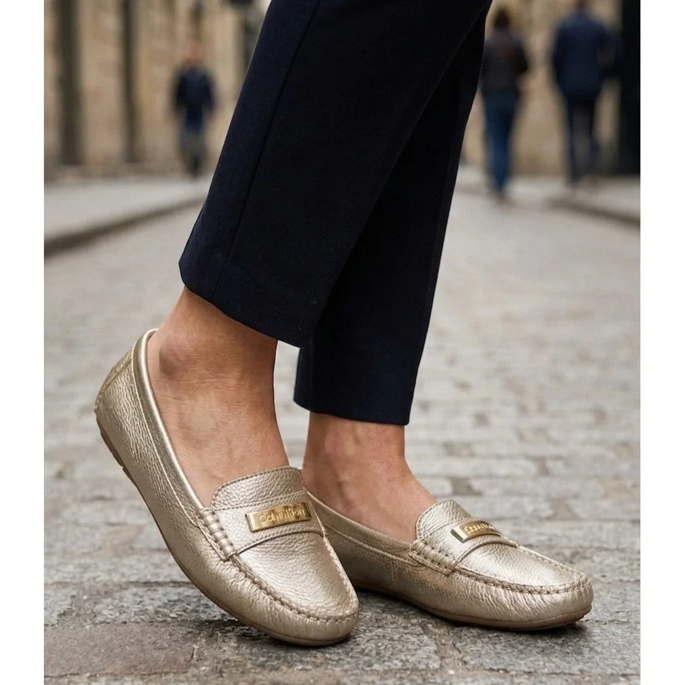 Calvin Klein Leta Metallic Gold Leather Loafers Driving Mocs Logo Hardware 8.5